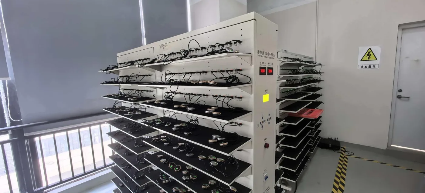 Aging test racks for smartwatch units