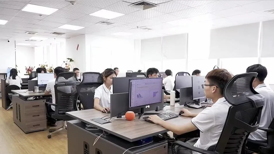 Open-plan office of the VitalWatch team in Shenzhen — staff at workstations